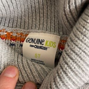 Kids Oshkosh patterned sweater with shawl neck. 5T